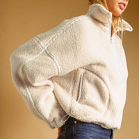 Meli Zip Up