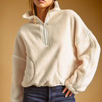 Meli Zip Up